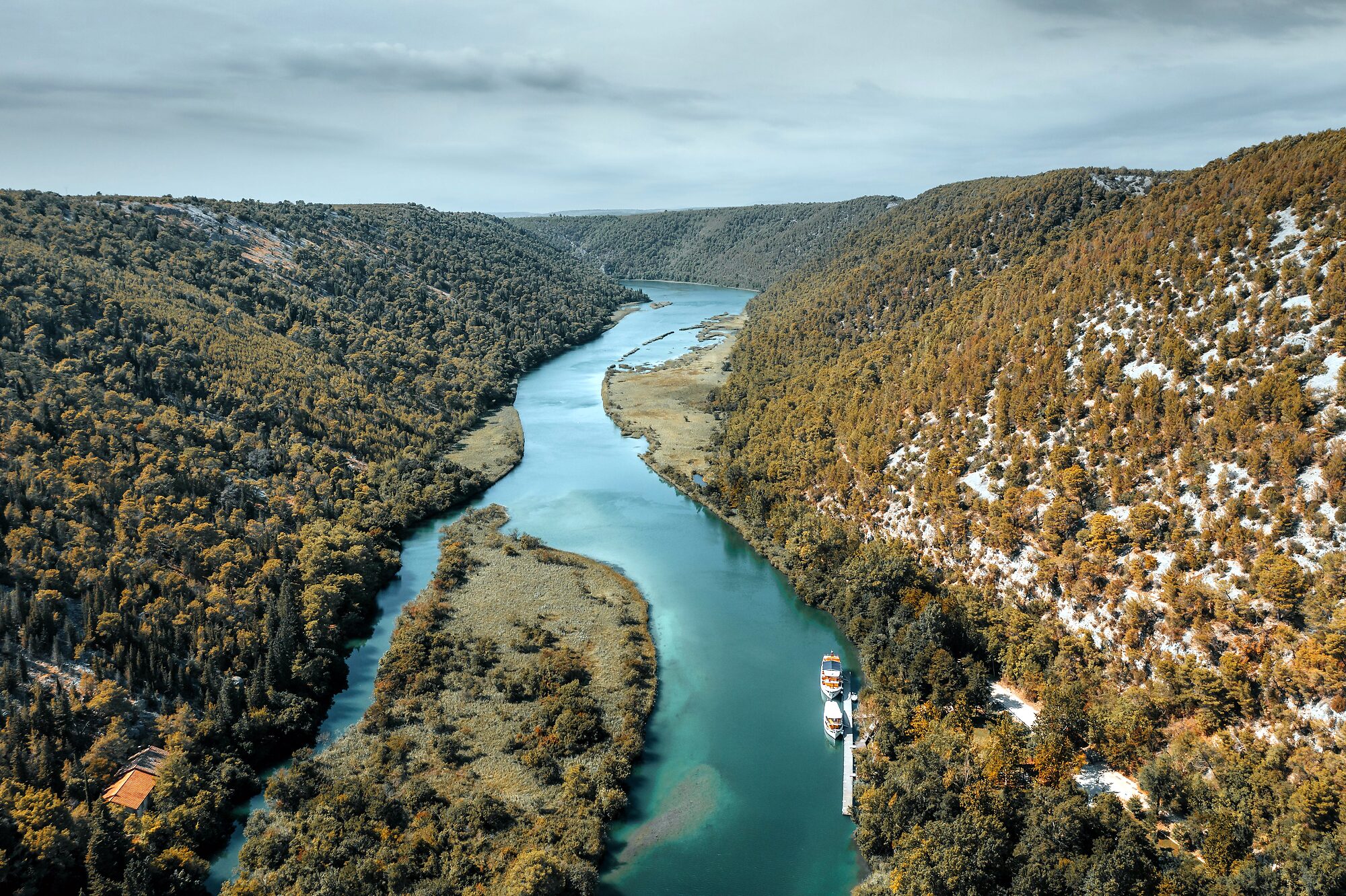 The Krka river winding through its canyon toward the sea